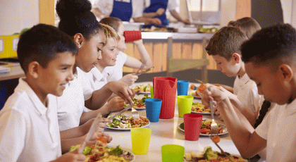 Children eating lunch at school